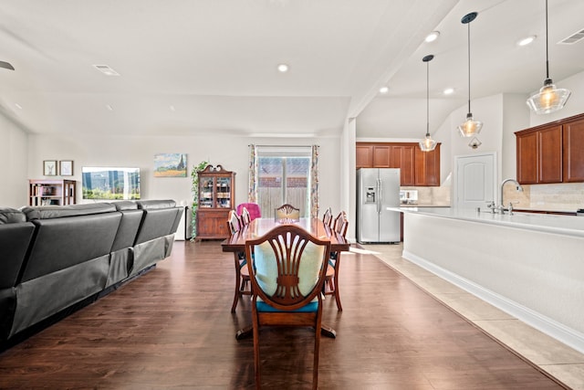 dining room with dark wood-style flooring, visible vents, and recessed lighting