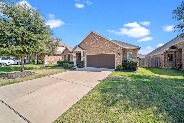 view of front of property with brick siding, concrete driveway, an attached garage, fence, and a front lawn