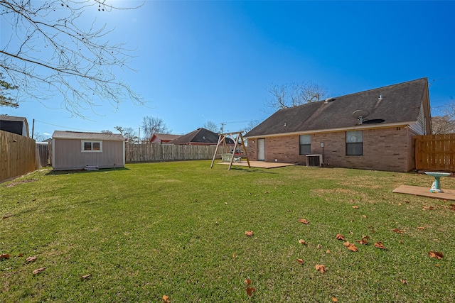 306 Marion St, Brazoria, TX 77422 - view of yard featuring central AC and a patio area
