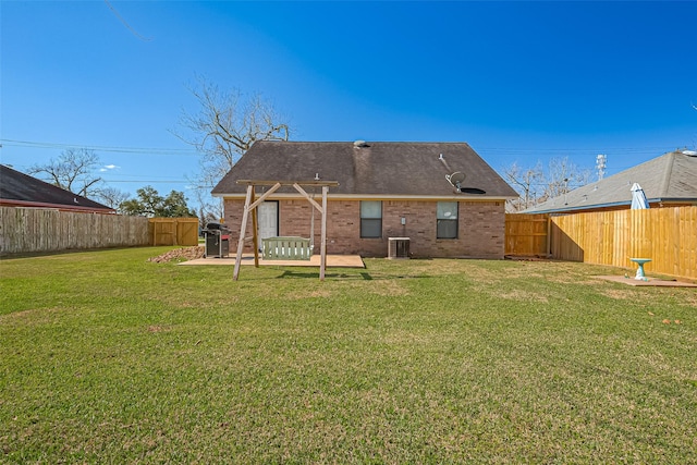 306 Marion St, Brazoria, TX 77422 - back of house featuring a patio, a pergola, brick siding, and cooling unit