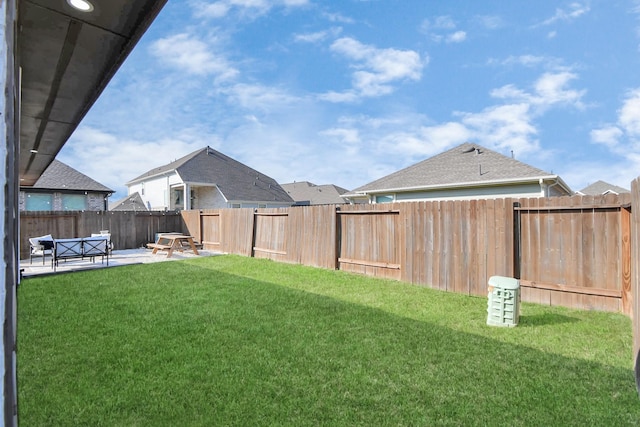 view of yard featuring a fenced backyard and a patio