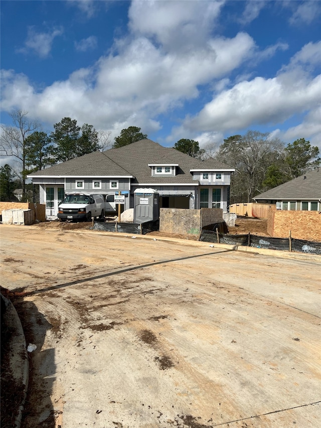 view of front of property with fence