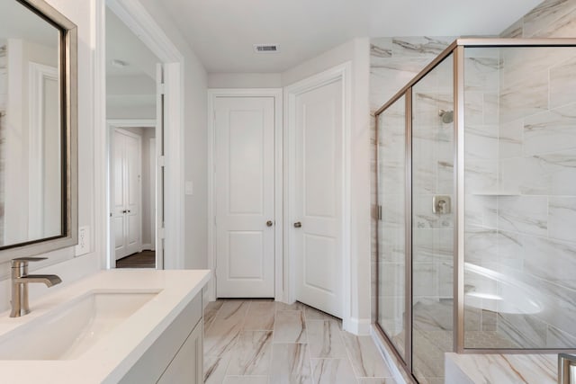 full bathroom with vanity, visible vents, marble finish floor, and a stall shower