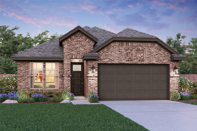 view of front of property with driveway, roof with shingles, an attached garage, a front lawn, and brick siding