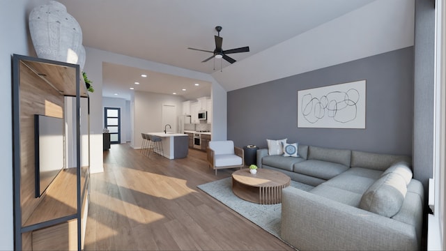living area featuring recessed lighting, a ceiling fan, and wood finished floors