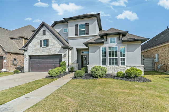 view of front facade featuring stucco siding, concrete driveway, an attached garage, a front yard, and stone siding