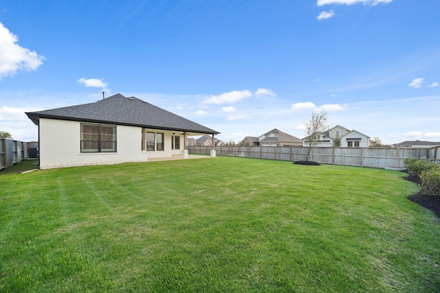 5715 Caracara St, Manvel, TX 77578 - view of yard with a fenced backyard and a patio