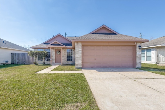 view of front of house with brick siding, concrete driveway, fence, a garage, and a front lawn