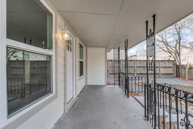 view of patio featuring fence