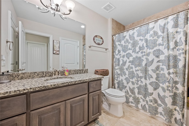 bathroom with a chandelier, curtained shower, toilet, vanity, and visible vents