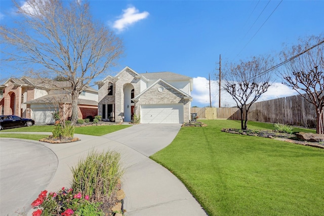 view of front of property with driveway, a garage, fence, a front lawn, and brick siding