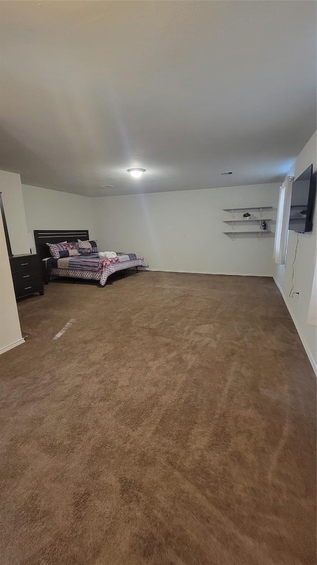 unfurnished bedroom featuring carpet flooring