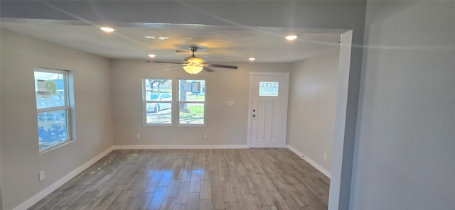 716 Alamo St, Rosenberg, TX 77471 - foyer with wood finished floors, baseboards, recessed lighting, and a ceiling fan
