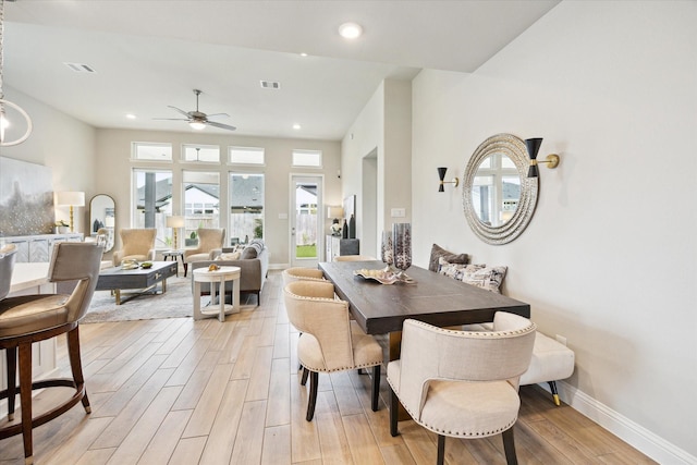 dining space with recessed lighting, baseboards, visible vents, and light wood finished floors