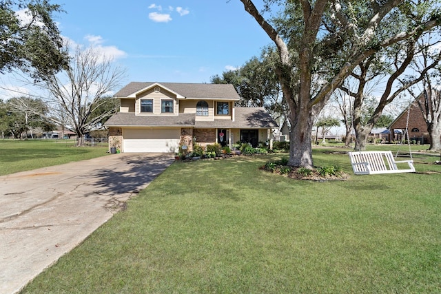 traditional home with driveway, an attached garage, fence, and a front lawn