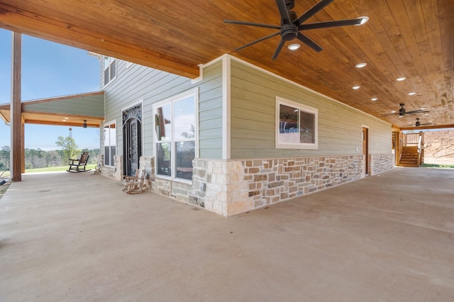 view of patio featuring a ceiling fan