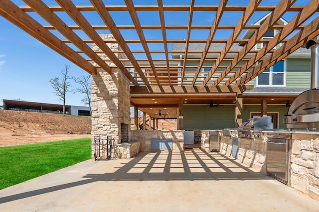 view of patio / terrace featuring ceiling fan, exterior kitchen, a grill, and a pergola