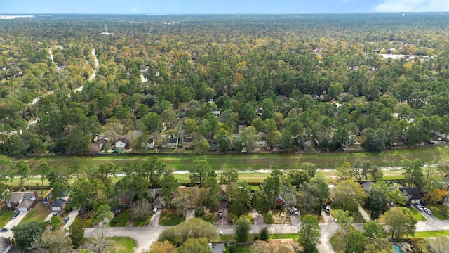 drone / aerial view with a view of trees