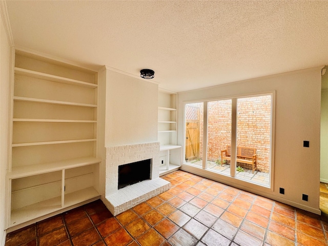 unfurnished living room featuring a textured ceiling, a fireplace, baseboards, and built in features