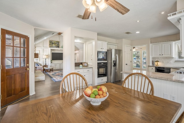 dining space with ceiling fan, visible vents, dark wood finished floors, and recessed lighting