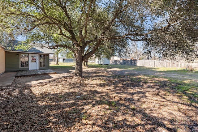 view of yard with fence