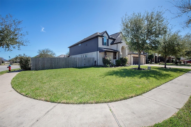 view of property exterior featuring a garage, concrete driveway, a yard, and fence