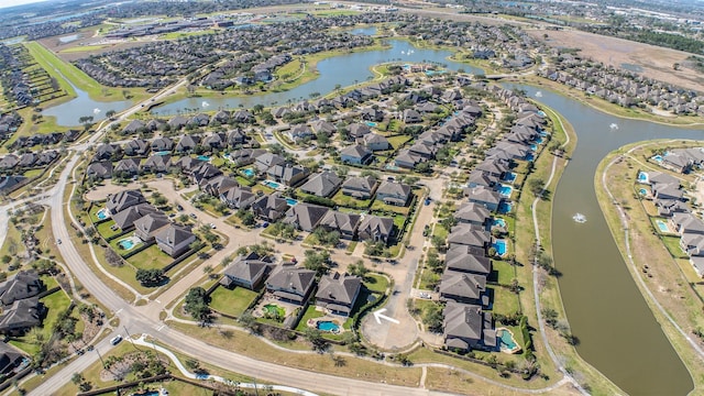 aerial view featuring a water view and a residential view