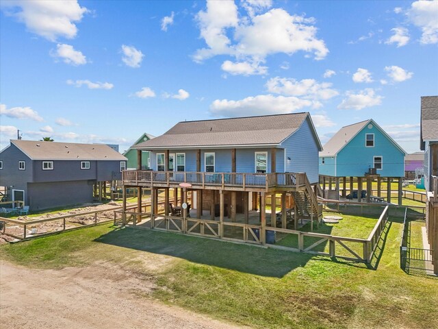 1922 Blue Water Hwy, Surfside Beach, TX 77541 - back of house featuring a wooden deck, stairway, roof with shingles, and a residential view