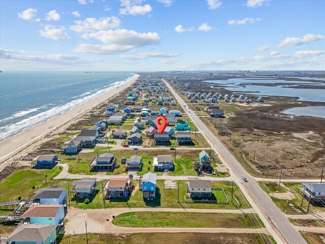 1922 Blue Water Hwy, Surfside Beach, TX 77541 - aerial view of residential area featuring waterfront with a beach