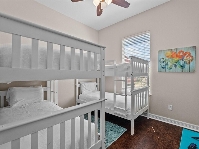 1922 Blue Water Hwy, Surfside Beach, TX 77541 - bedroom with wood finished floors, baseboards, and a ceiling fan