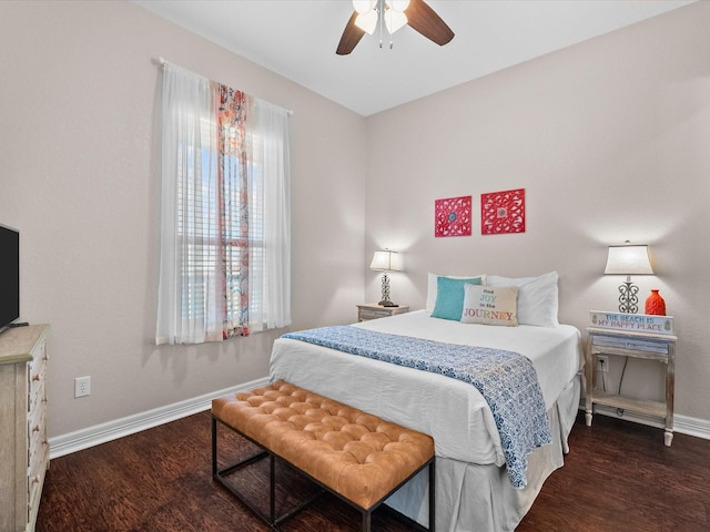 1922 Blue Water Hwy, Surfside Beach, TX 77541 - bedroom featuring baseboards, wood finished floors, and ceiling fan