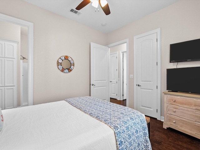 1922 Blue Water Hwy, Surfside Beach, TX 77541 - bedroom featuring dark wood-style flooring and ceiling fan