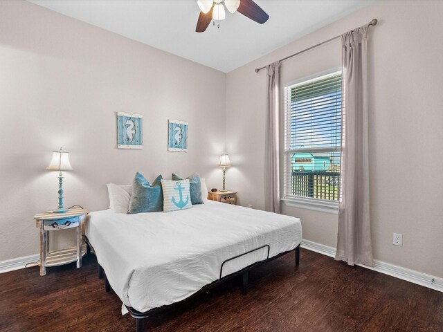 1922 Blue Water Hwy, Surfside Beach, TX 77541 - bedroom with wood finished floors, baseboards, and ceiling fan