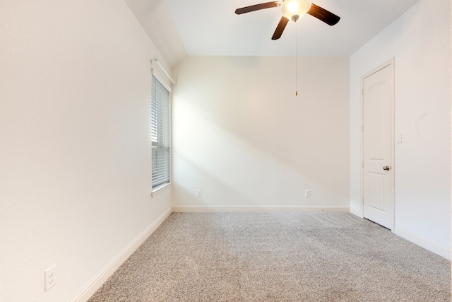 unfurnished room featuring a ceiling fan, carpet flooring, and baseboards