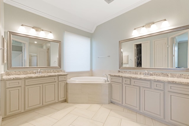 bathroom featuring tile patterned flooring, vanity, a bath, and crown molding