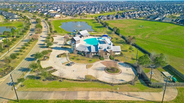 aerial view with a water view and a residential view