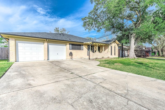 ranch-style house with an attached garage, brick siding, fence, concrete driveway, and a front yard