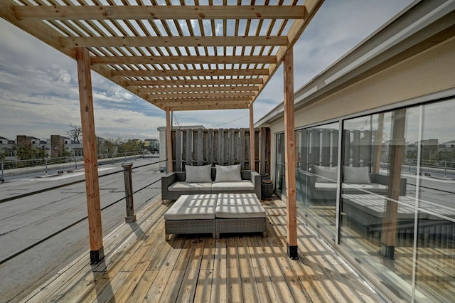 deck featuring outdoor lounge area and a pergola