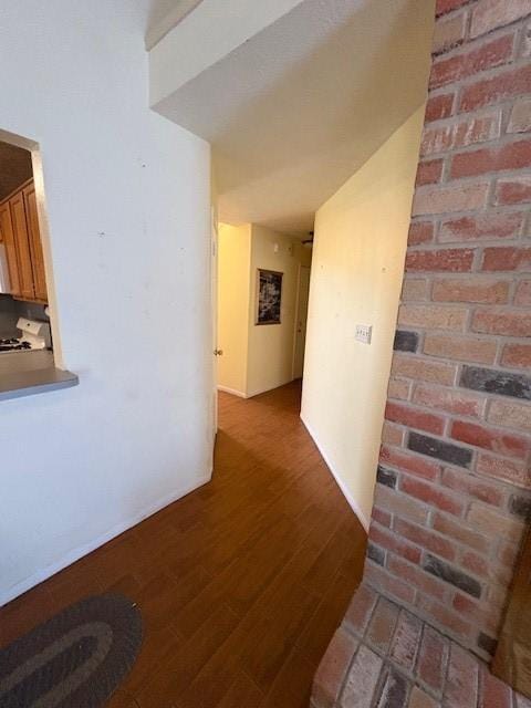 9427 Walnut Glen Dr, Houston, TX 77064 - hallway featuring baseboards and wood finished floors