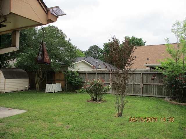 9427 Walnut Glen Dr, Houston, TX 77064 - view of yard with an outbuilding, fence, and a storage unit
