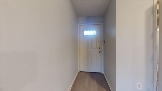 2323 Fairwind Rd Unit 860, Houston, TX 77062 - doorway to outside with baseboards and wood finished floors