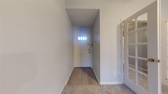 2323 Fairwind Rd Unit 860, Houston, TX 77062 - entryway featuring carpet and baseboards