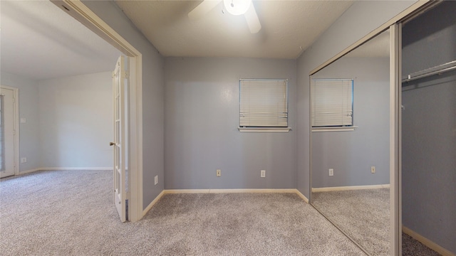 2323 Fairwind Rd Unit 860, Houston, TX 77062 - unfurnished bedroom featuring carpet, ceiling fan, and baseboards