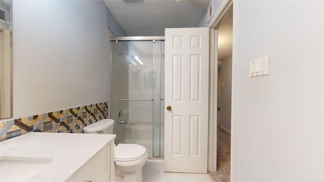 2323 Fairwind Rd Unit 860, Houston, TX 77062 - bathroom with tile patterned flooring, toilet, visible vents, vanity, and a shower stall
