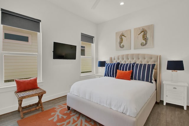 bedroom featuring recessed lighting, wood finished floors, and baseboards