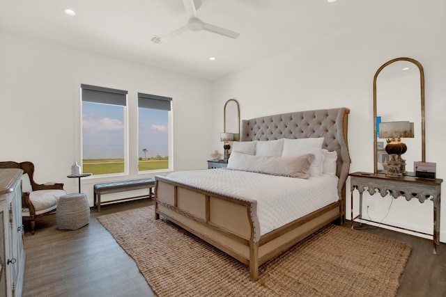 bedroom with wood finished floors, a ceiling fan, and recessed lighting