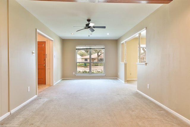 spare room with light carpet, ceiling fan, recessed lighting, and baseboards