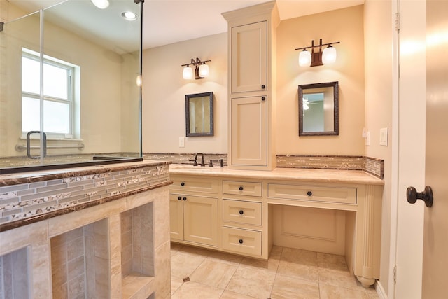 full bath with a shower with shower door, tile patterned flooring, and vanity