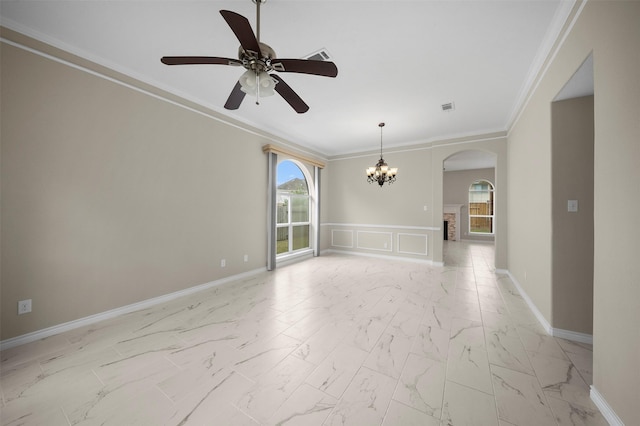 unfurnished room featuring a fireplace, visible vents, baseboards, marble finish floor, and ornamental molding