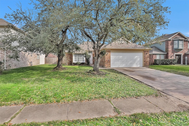 view of front facade with an attached garage, a front lawn, concrete driveway, and brick siding